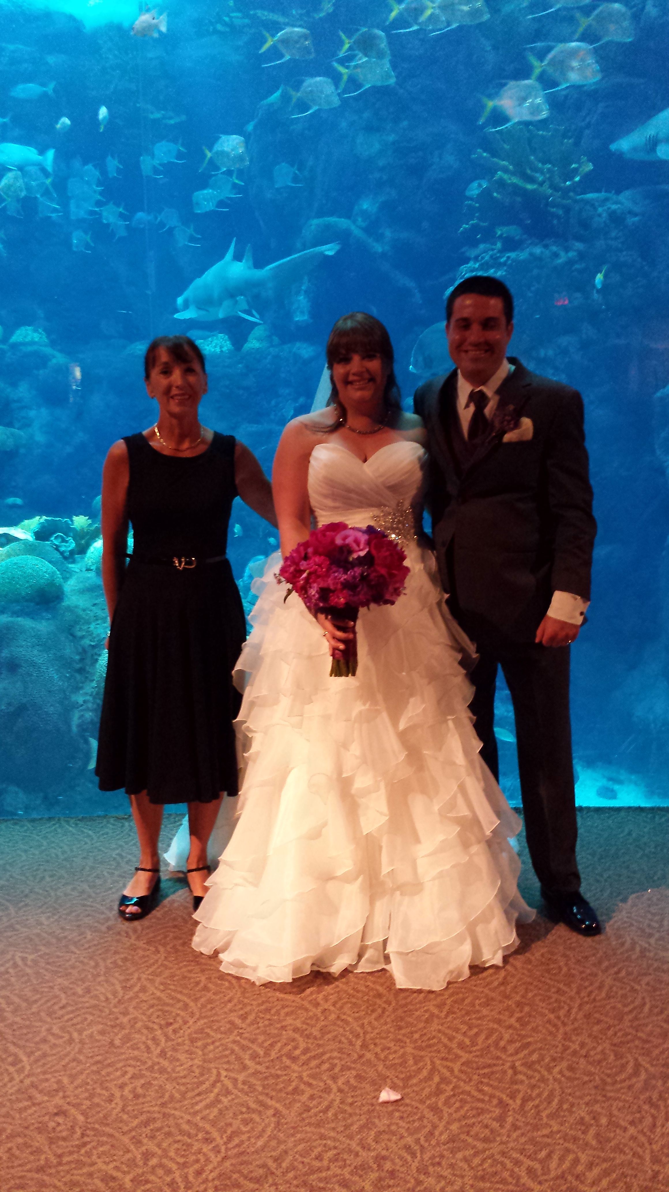 Charmaine (Tampa area wedding officiant), with Megan & Greg at their Tampa Florida Aquarium Wedding