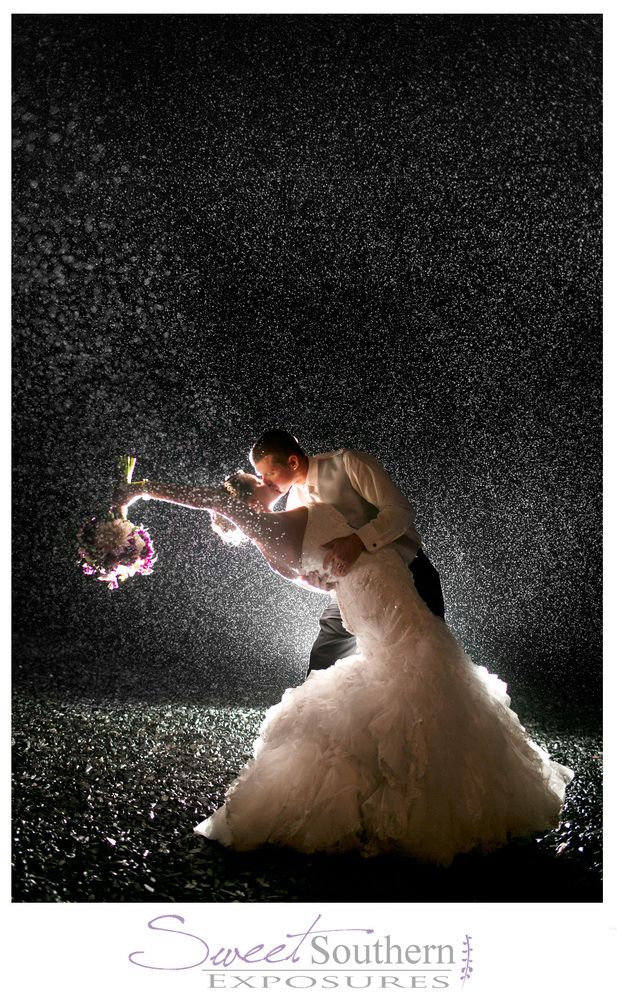 If it does rain on your wedding day try to capture the moment with an awesome picture. Photo from 